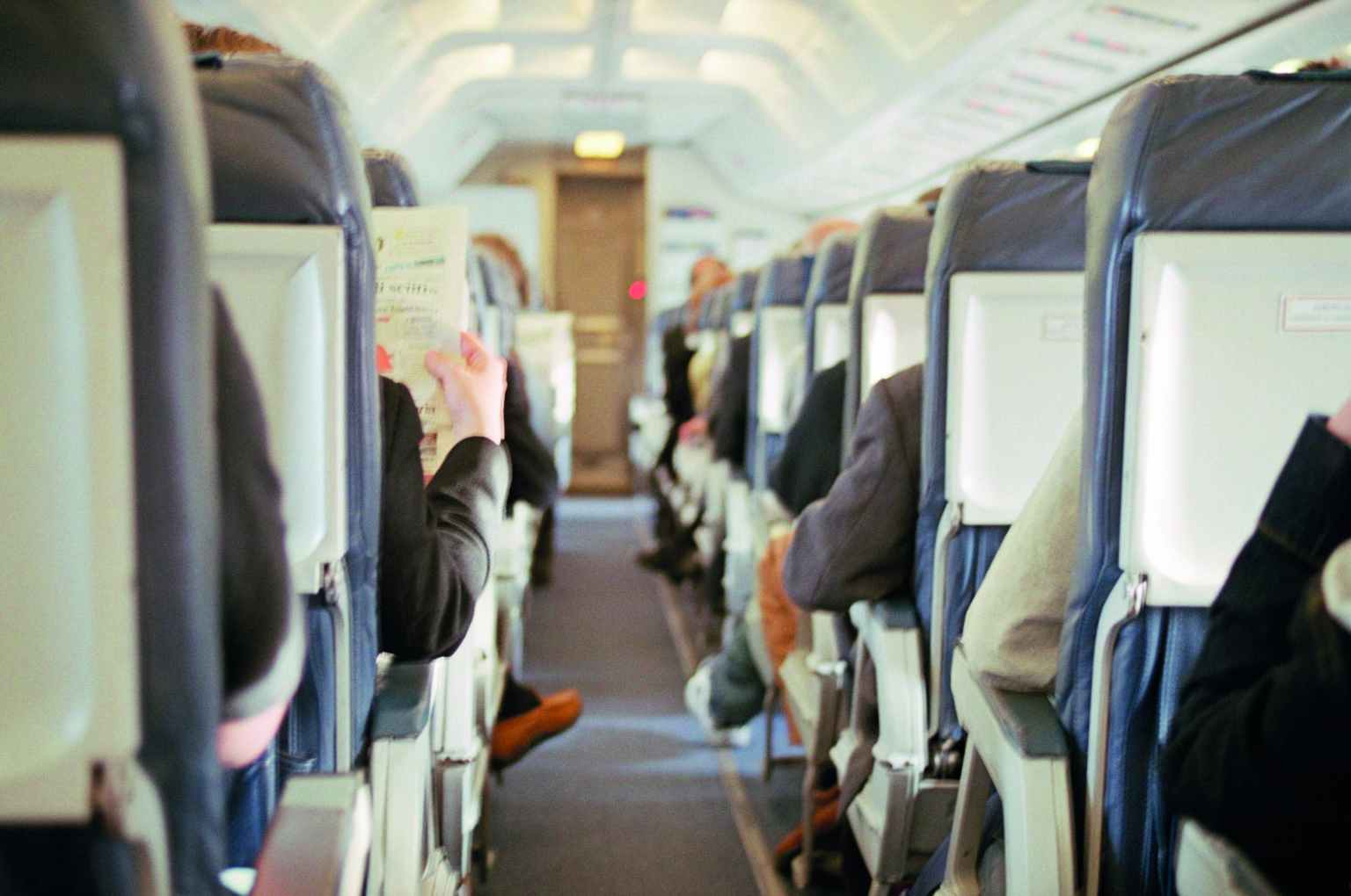 o-PERSON-SITTING-IN-AIRPLANE-facebook